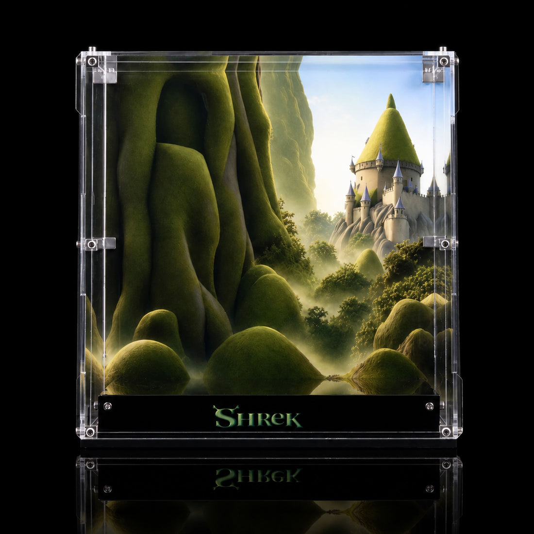 A clear acrylic display case featuring LEGO Shrek figures, shown in a themed forest setting with castle and trees in the background. The case has a black base with the word 'Shrek' on it, and the Happy Brick Land logo appears in the bottom left corner.