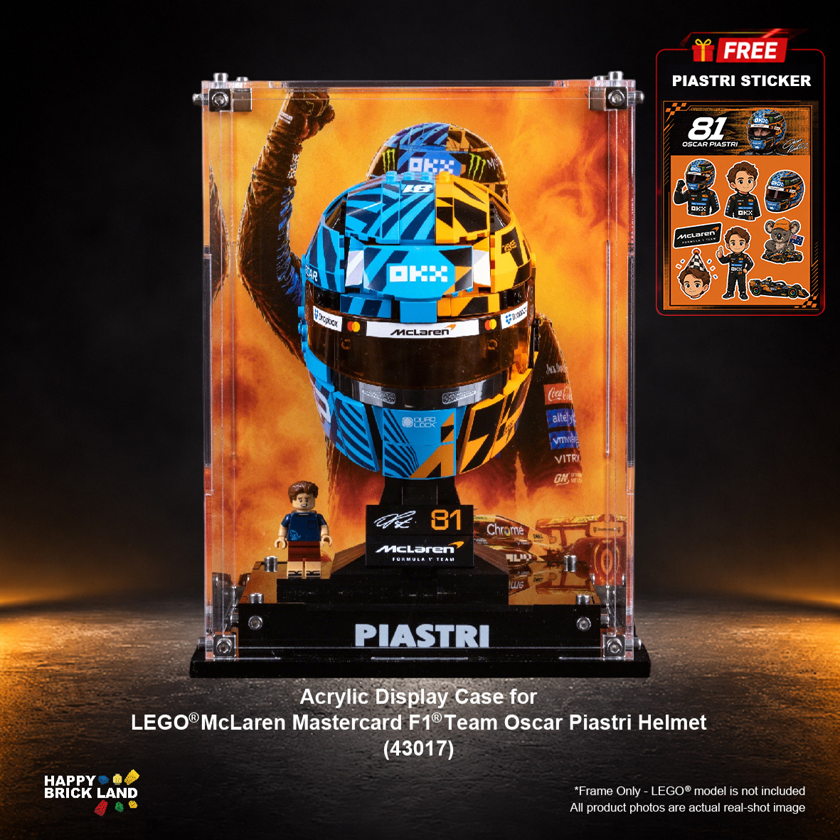 LEGO Brick Land display case for a McLaren F1 Oscar Piastri helmet, featuring a clear acrylic case with a printed helmet graphic, a small LEGO minifigure, and a black base labeled PIASTRI, shown on a dark studio background with promotional sticker graphics.